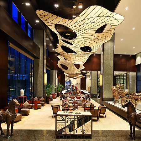 Отель Hualuxe Wuxi Taihu Экстерьер фото