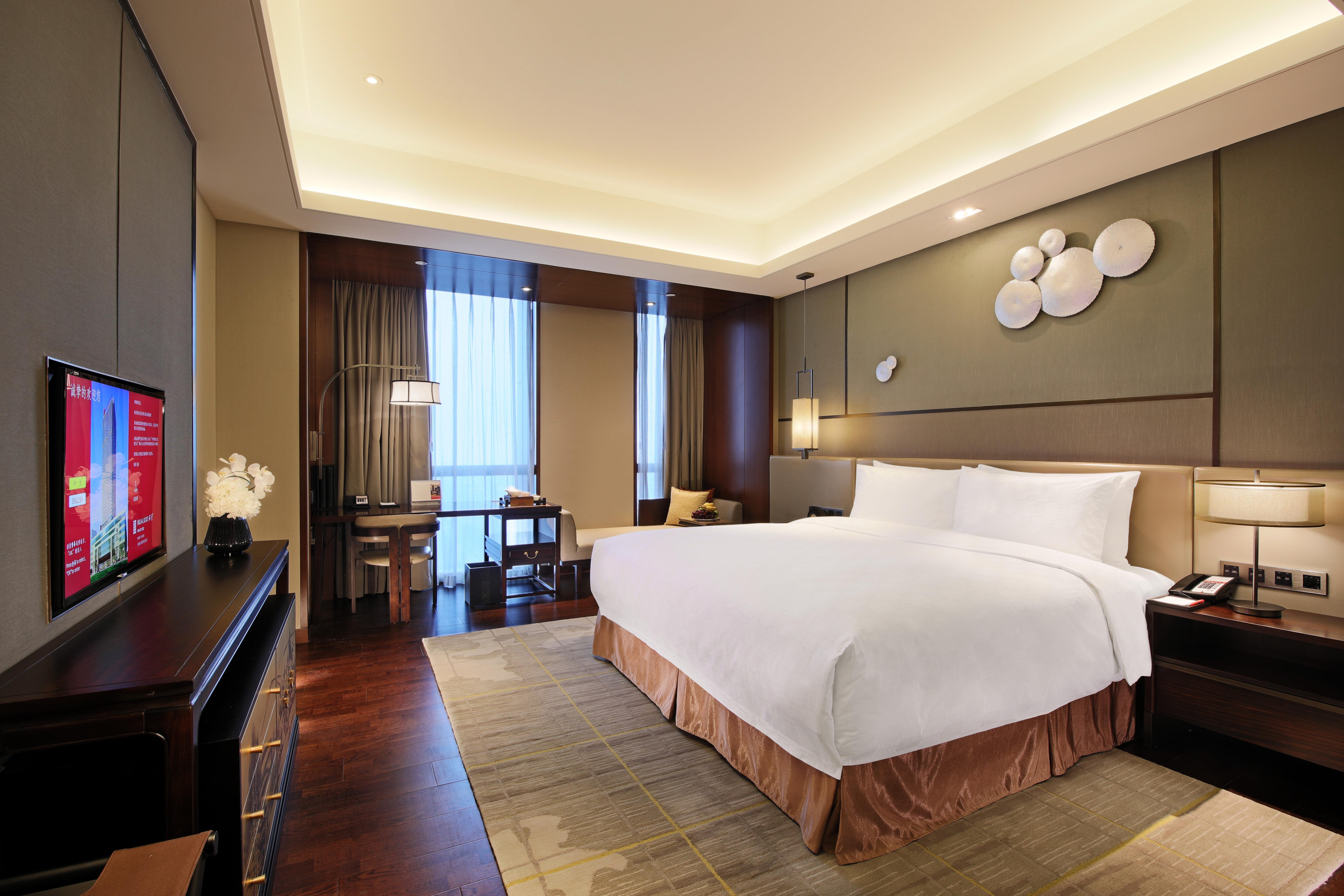 Отель Hualuxe Wuxi Taihu Экстерьер фото