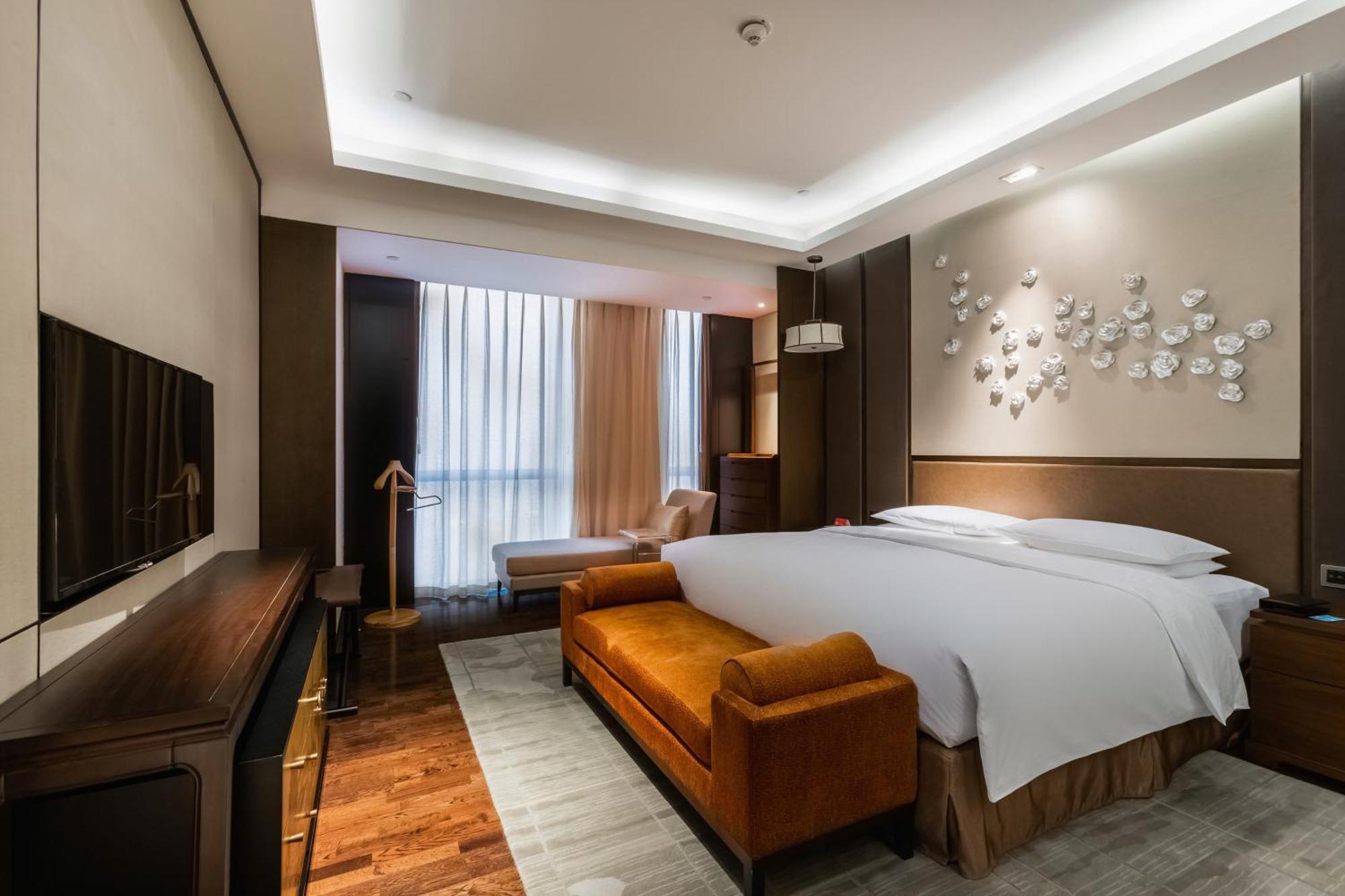 Отель Hualuxe Wuxi Taihu Экстерьер фото